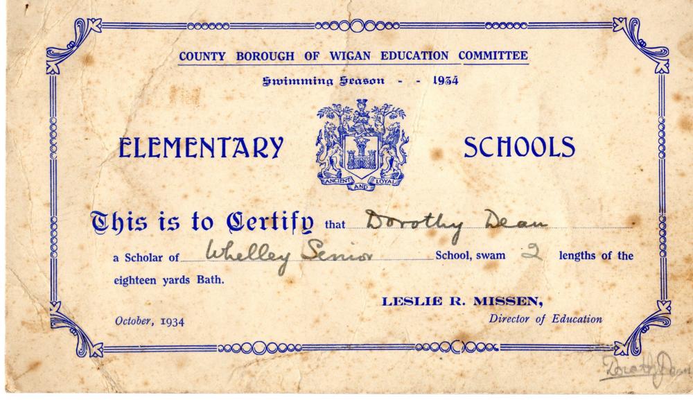 Mother's swimming certificate.