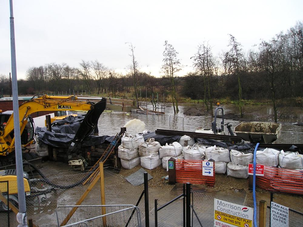 The Douglas floods into the works compound.16-01-08.