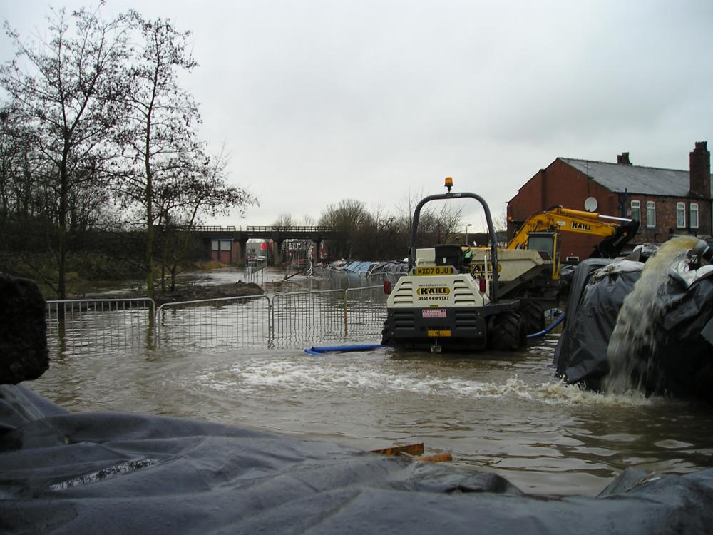 16-01-08. The Douglas in flood heading towards Adam Bridge & Asda.