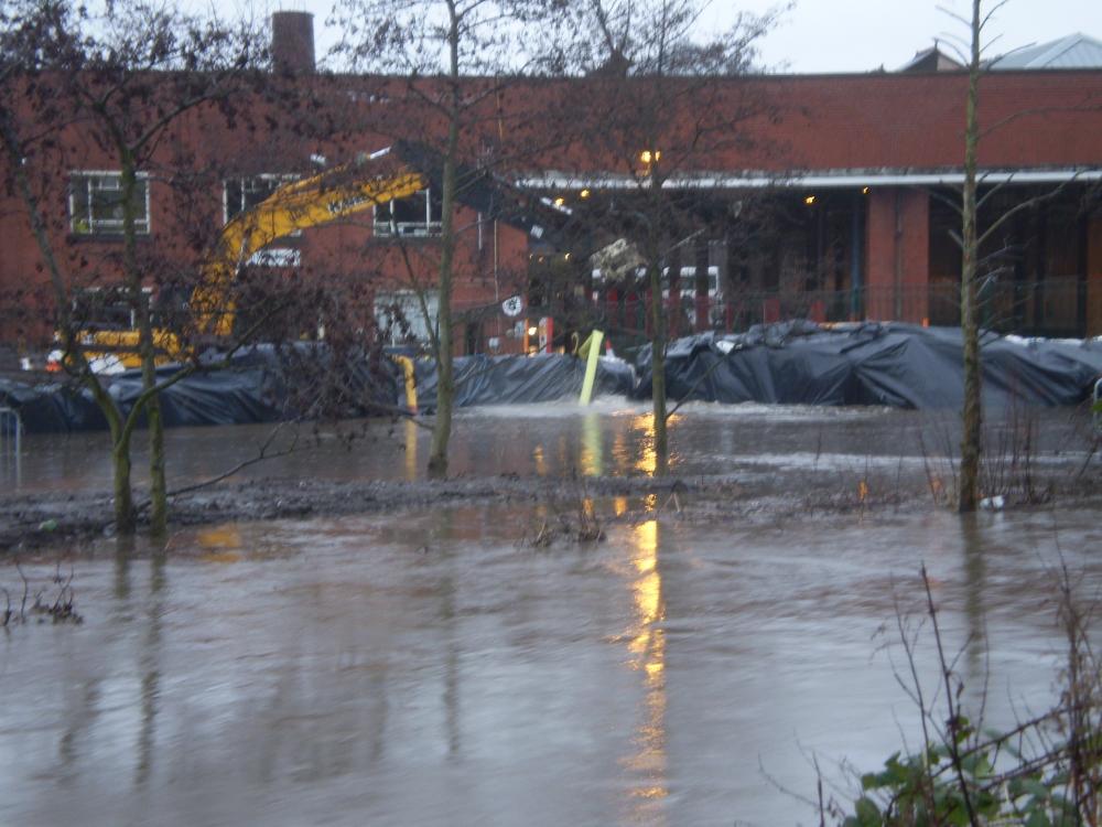 The Floods of 16-01-08.-Melverley Street Bus Depot from the river bank.