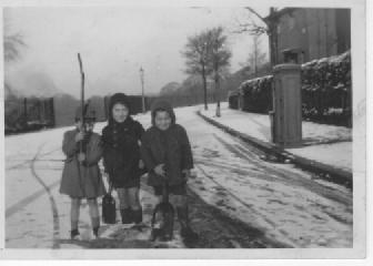 Three lads in the snow, 1940's
