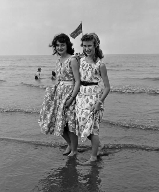 Two Wigan ladies paddling on Blackpool beach.