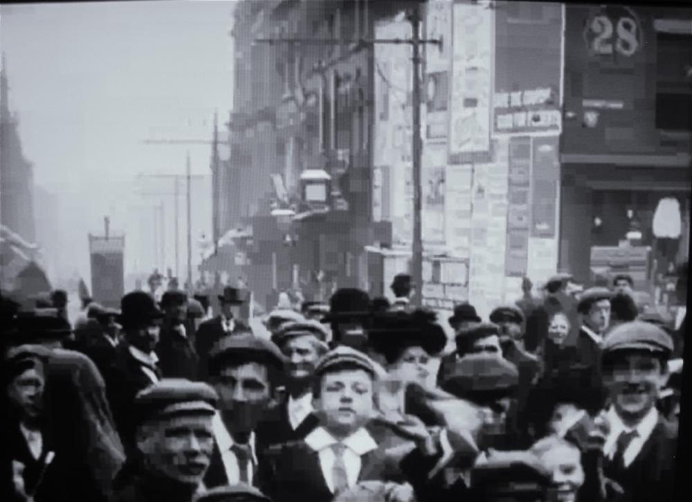 Living Wigan 1902,the camera pans around the crowd