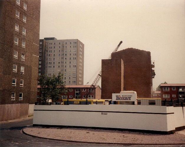 The maisonettes In Thackeray place being demolished the old fashioned way