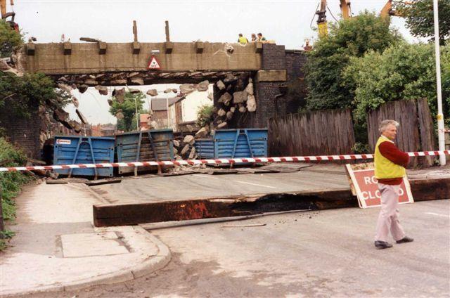 Demolition of old railway bridge on Wigan Road, 1990.