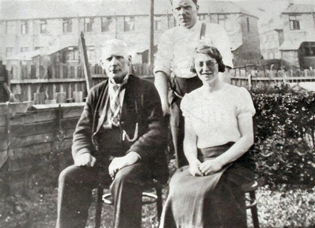John Morris with son Billie and daughter in law Gladys (nee Pierrepoint), c1930.
