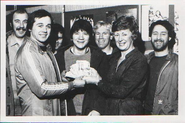 Players presenting a cheque to Hope School, c1980/81.
