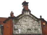 Old Sign in Queen Street.