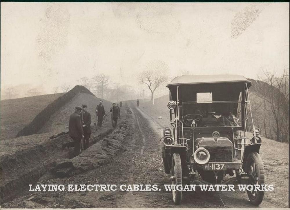LAYING THE ELECTRIC CABLE early 1900's