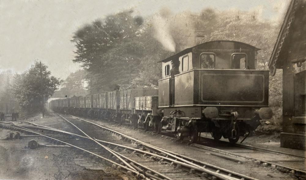 Postcard photo of an Atkinson Walker Wagons Ltd locomotive in STEAM!