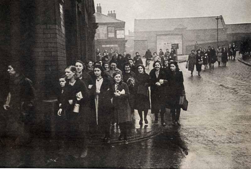 Mill girls arrive for work at Eckersley's Mills.