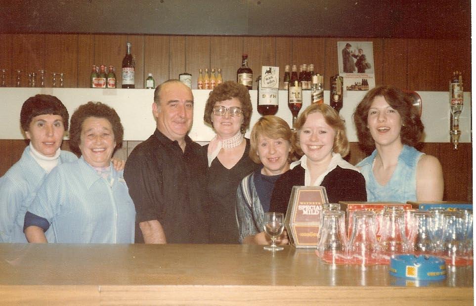 St Cuthberts bar staff, with the parish priest, 