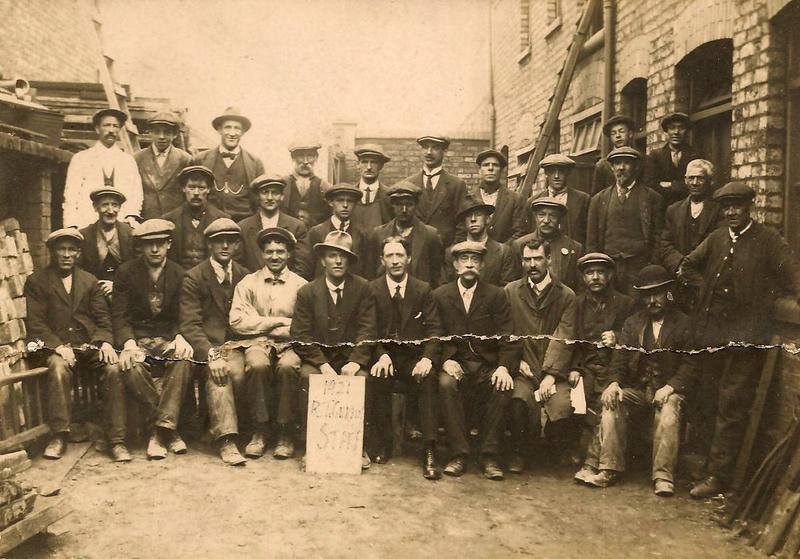 Foreman Peter Fairhurst (wearing the trilby) with his fellow workmen